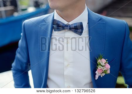 Handsome Groom In Suit On The Nature. Male Portrait In The Park. Beautiful Model Boy In Colorful Wed