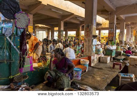 Pondicherry, INDIA - February 21, 2014. Unknown people selling fishs at a street market, main daily market.