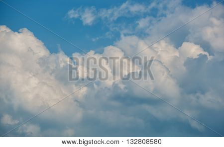 Great billowing clouds against a blue sky.