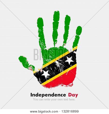 Hand print, which bears the Flag of Saint Kitts and Nevis. Independence Day. Grunge style. Grungy hand print with the flag. Hand print and five fingers. Used as an icon, card, greeting, printed materials.