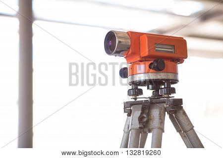 Using a level. A level standing in a building, may be used in different construction works