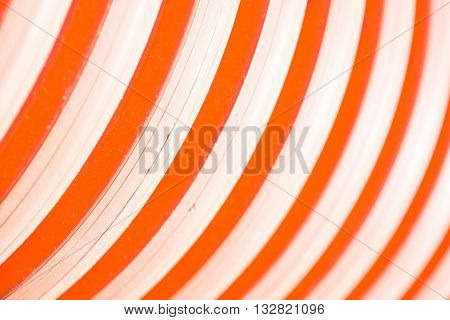 Only red. A part of red tube, picture may be used as a background