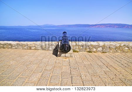 historical cannon of the fortification of Hydra island Saronic gulf Greece