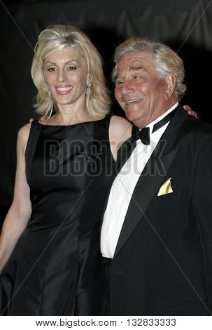 Peter Falk and wife Shera Danse at the 'In Defense of Animals Hosts 2nd Annual Guardian Award' at the Paramount Studios in Los Angeles, USA on October 30, 2004.