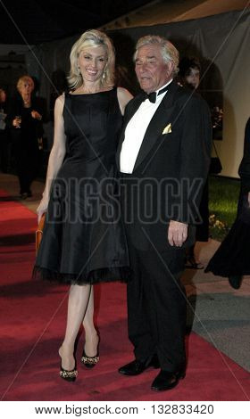 Peter Falk and wife Shera Danse at the 'In Defense of Animals Hosts 2nd Annual Guardian Award' at the Paramount Studios in Los Angeles, USA on October 30, 2004.