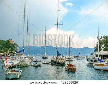 Santa Margherita Ligure, Liguria, Italy - circa June 2010: fishing boats, sailboats and motorboats in the port of one of the most popular resorts on Italian Ligurian coast in summer.