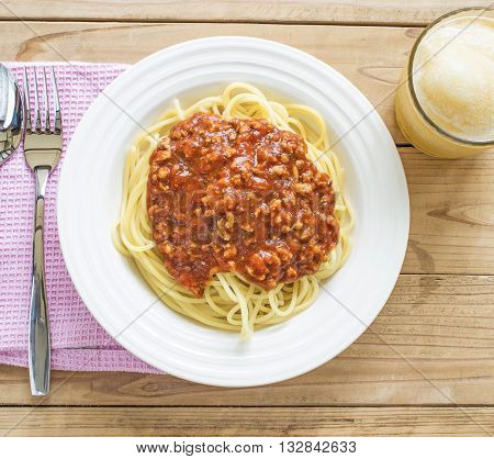 Dish of Italian spaghetti with rich tomato based Bolognaise sauce