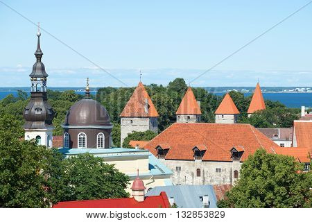 TALLINN, ESTONIA - AUGUST 01, 2015: View of the roofs of the houses in the old Tallinn, august day. Historical landmark of the Estonia