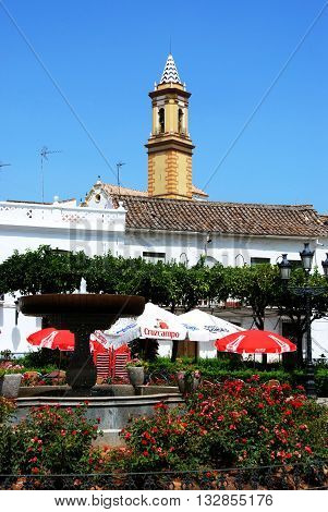 ESTEPONA., SPAIN - JULY 18, 2008 - Fountain and pavement cafes in the Plaza las flores Estepona Malaga Province Andalucia Spain Western Europe, July 18, 2008.