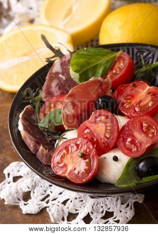 Homemade cooking traditional meat stew with beef lemon onions tomato.