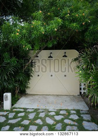 Rain Shower Outdoor at swimming pool Surrounded by trees Exposure to natural wholesome