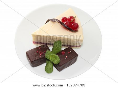 Cheesecake is a sweet dessert consisting of one or more layers. The main and thickest layer consists of a mixture of soft fresh cheese eggs and sugar. Is usually sweetened with sugar and may be flavored or topped with fruit cream nuts.
