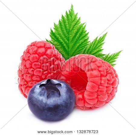 Two raspberries with leaf and one blueberry isolated on white background with clipping path