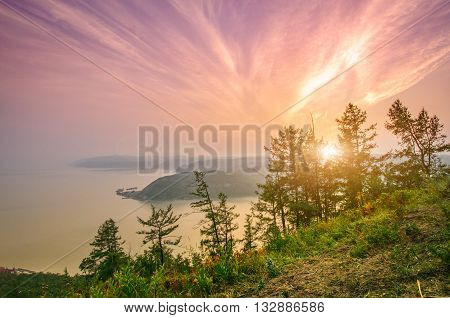 Lake Baikal Siberia Russia. Purple sunset surrealistic landscape