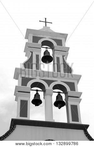 Bell tower of old churche in Piskopiano Crete Greece. Black and white.