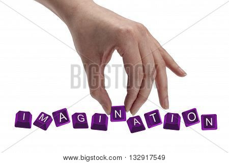 keys spelling the word imagination isolated on white background