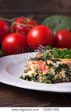 Frittata With Spinach, Tomatoes And Cheese