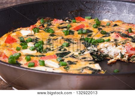 Frittata With Spinach, Tomatoes And Cheese