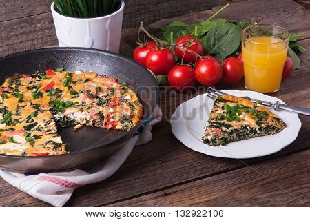 Frittata With Spinach, Tomatoes And Cheese
