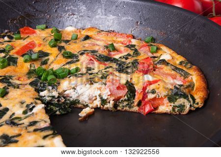 Frittata With Spinach, Tomatoes And Cheese