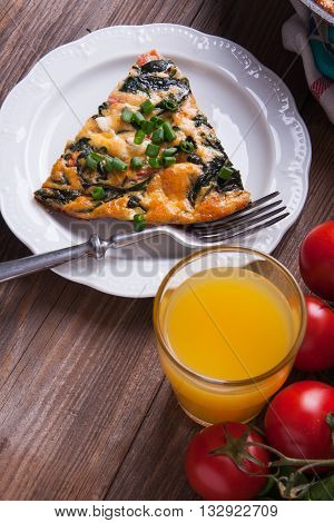 Frittata With Spinach, Tomatoes And Cheese