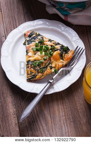 Frittata With Spinach, Tomatoes And Cheese
