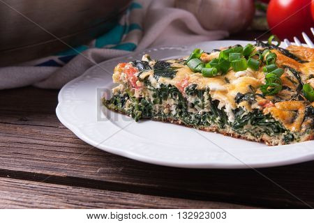 Frittata With Spinach, Tomatoes And Cheese