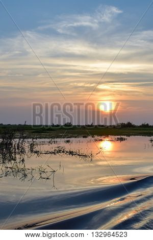 Sunset on Tonle Sap Lake, Cambodia during summer