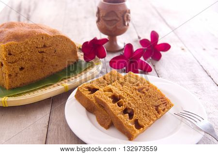 Ma Lai Gou-Traditional malaysia steamed cake on plate and banana leaf.