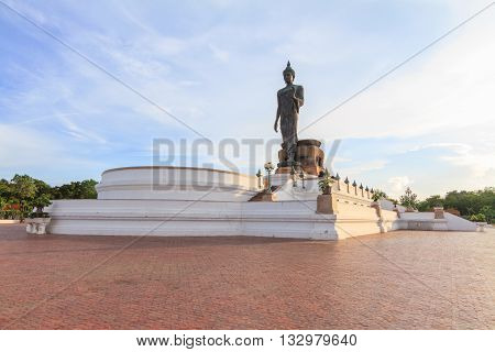 Phutthamonthon,NakhonPathom,Thailand - June 4 , 2016 :Big Buddha statue at the lake in sunset time