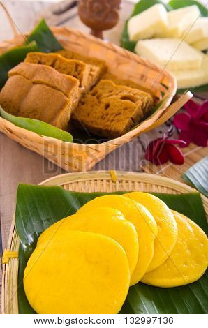 Ma Lai Gou-Traditional malaysia steamed cake. Steam chinese cake on bamboo plate. Chinese egg cake on banana leaf.