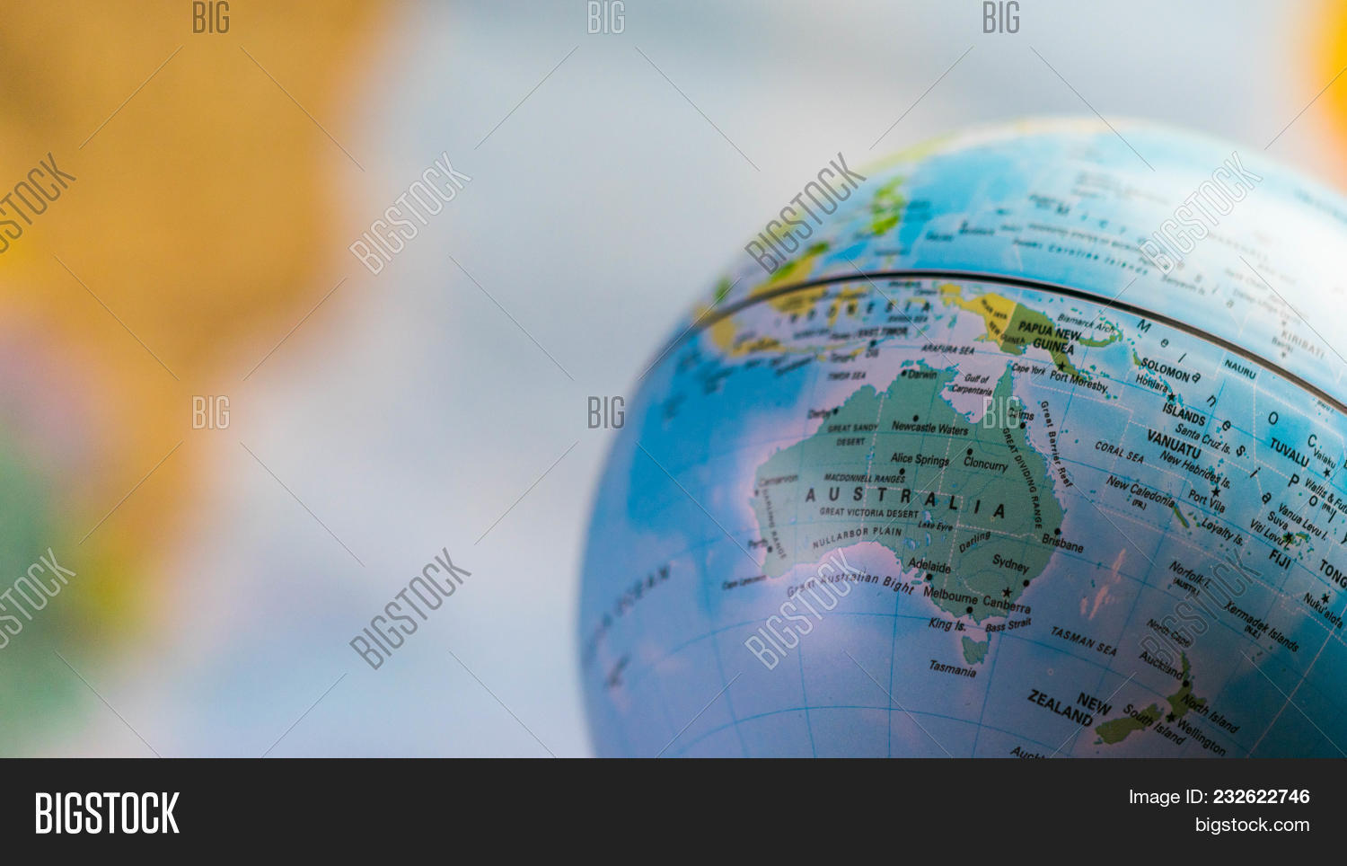 australia map on a globe with earth map in the background