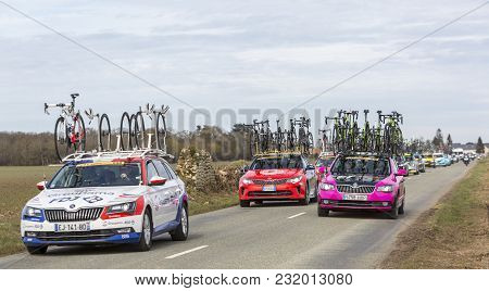 Fains-la-folie, France - March 5, 2018: Rear Image Of The Convoy Of Technical Cars Of The Teams Driv