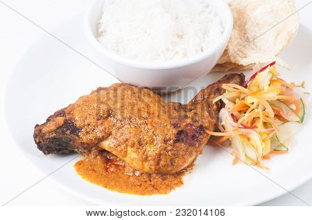 Classic Chicken Rendang With Rice And Vegetable Pickles