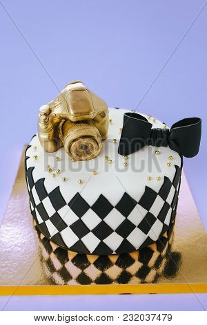 Black And White Birthday Cake For Photographer On Blue Background. With Russion Inscription Happy Bi