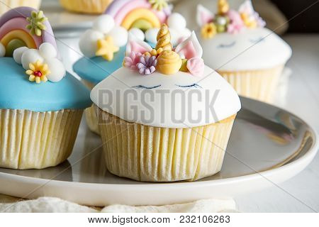 A Capcake In The Form Of A Unicorn, A Rainbow. A Feast For A Little Princess. White Background