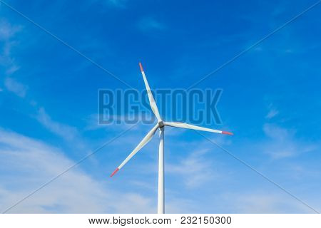Rotating Windmill Generating Renewable Energy With Wind Power. Sustainability By Windmills Turbines 