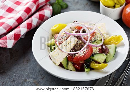 Greek Salad With Fresh Vegetables, Olives And Feta Cheese