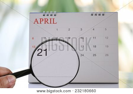Magnifying Glass In Hand On Calendar You Can Look Twentieth One Day Of Month,focus Number Twenty-one