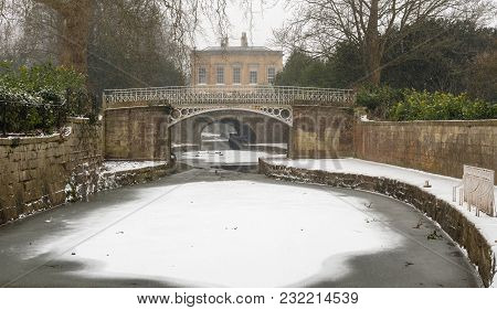 Kennet And Avon Canal Frozen In Bath. Iced Formed On Surface Of Waterway By Sydney Gardens, Running 
