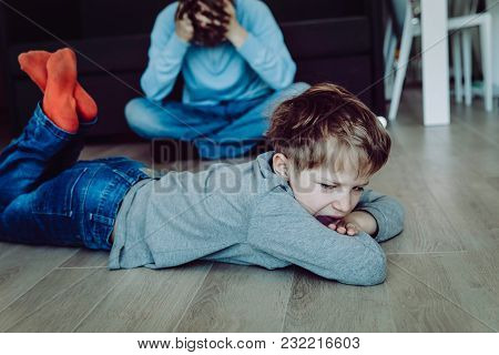 Angry Stressed Child And Tired Father, Family Problems