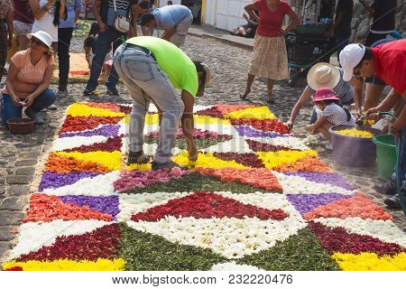 Antigua, Guatemala: March 18 2018: Locals Working On Alfombres, Flower Carpets With Blossoms And Wat