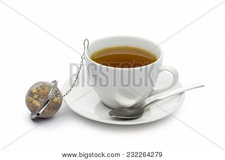 Cup Of Tea With Infuser On White Background