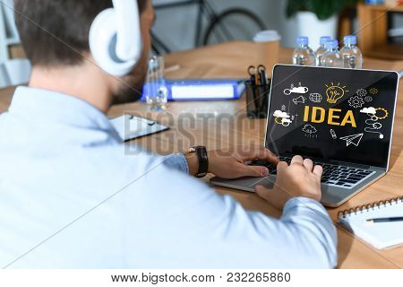Cropped Image Of Woman Holding Digital Tablet With Inscription Practice Makes Perfect On Screen
