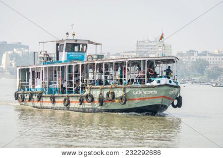 Kolkata, India - 4 March 2018:  An Isolated View Of A Ferry Crossing River Ganges Or Ganga With Comm