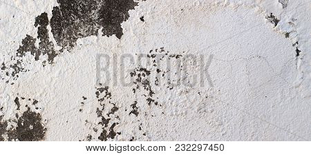 Old Cracked Rought Dark And White Plaster Wall Texture Banner Background.