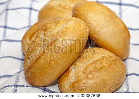 Fresh Bread Rolls On A Towel Ready To Eat