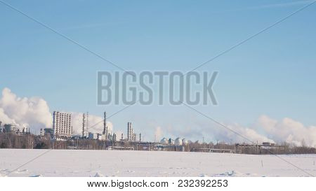 Skyline Of The Industrial City And A Large Energy And Chemical Plant With Pipes And Tanks, Urban Eco