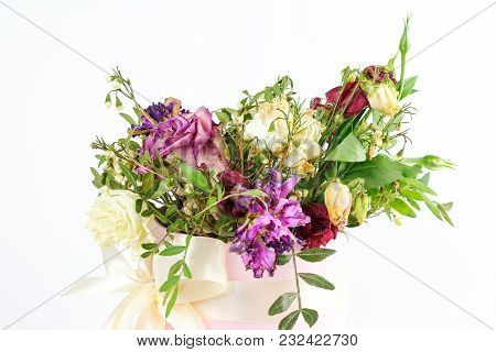 Composition Of Dried Flowers In A Pink Hatbox. Tied With Wide White Ribbon And Bow.