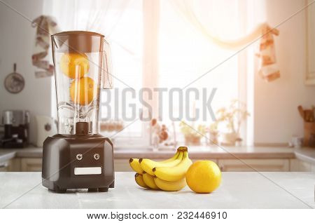 Metal Food Blender Close-up With Fresh Exotic Tropic Fruits Next To It On Kitchen Background With Em